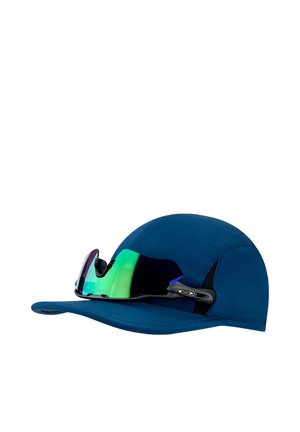 Blue sports cap with a pair of reflective green and black wraparound sunglasses resting on the brim against a white background.