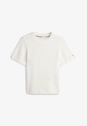Maglione bianco a maniche corte in maglia con orlo a costine e scollo tondo, caratterizzato da una texture delicata e un piccolo logo sulla manica sinistra.