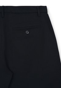 Black pants with a smooth texture, featuring a button closure, belt loops, and a rear pocket with a horizontal design and button detail.
