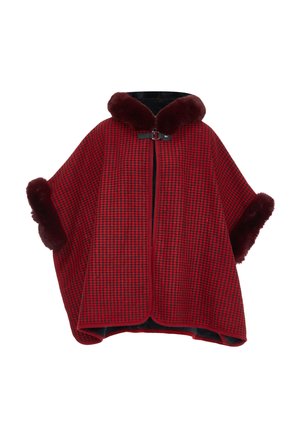 Puncho dengan pola houndstooth merah dan hitam, dilengkapi dengan kerah dan trim bulu sintetis, serta penutup ritsleting di depan dan lengan lebar yang longgar.