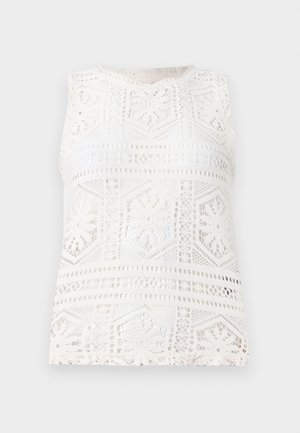 Haut en dentelle blanche sans manches avec des motifs géométriques et floraux en crochet, col rond et design semi-transparent.