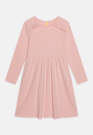 Soft pink, long-sleeve ribbed dress with gathered waist and small ruffle details on the upper chest near the shoulders.