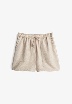 Beige shorts met een elastische tailleband en trekkoord, gemaakt van een textuurstof en met twee voorzakken. Lengte tot halverwege de bovenbenen.