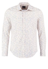 Long-sleeve shirt featuring a light cream background with scattered blue and pink polka dots. Made of soft fabric with button closure.