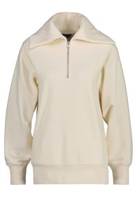 Felpa crema chiara con colletto alto, zip frontale e polsini a costine. Tessuto liscio con una vestibilità rilassata e design minimalista.