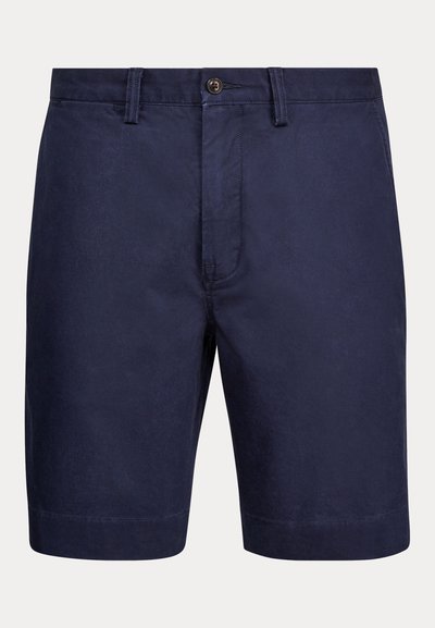 Navy blue men's mid-length shorts with belt loops, button closure, and clean, tailored design.
