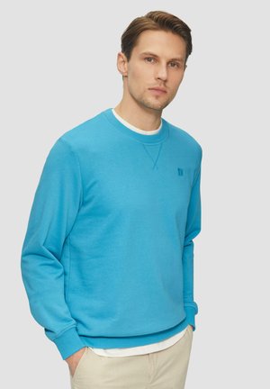 Lichtblauwe crewneck sweatshirt van zachte stof. Heeft ribgebreide boorden en zoom, met een subtiele logo-detail op de borst.
