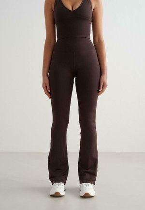 SEAMLESS FLARE  - Trousers - brown
