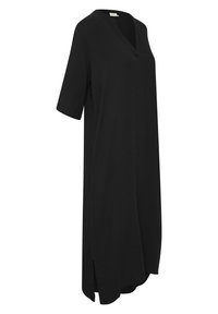 Robe noire jusqu'aux genoux, manches courtes, encolure en V et fentes sur les côtés. Réalisée en tissu texturé, avec une coupe ample et décontractée.