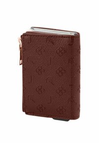 Compact bruin lederen portemonnee met geperste bloemen en "J" patronen, gedeeltelijk open met zilveren kaarthouders zichtbaar aan de binnenkant.