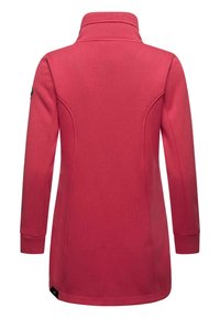 Red, long-sleeve pullover jacket with a high collar, structured seams, and ribbed texture. Features a logo patch on the left sleeve.