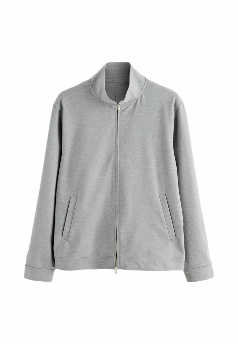 Gray zip-up jacket made of soft fabric, featuring a stand collar, side pockets, and a relaxed fit, with long sleeves and a front zipper.