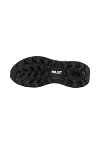 Semelle extérieure de chaussure noire avec un motif de traction robuste, présentant la marque "MILLET" et une surface texturée pour l'adhérence et la durabilité.