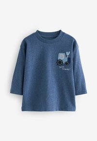 Blaues Baumwollhemd mit langen Ärmeln, das ein gesticktes Design eines Traktors und den Text "Farm Freunde!" in Weiß zeigt. Strukturiertem Stoff mit bunten Speckles.