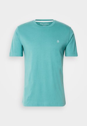 Turquoise short-sleeve T-shirt made from cotton, featuring a round neck and a small white "M OP" logo on the chest. Smooth texture.