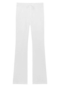 Pantalon blanc évasé en tissu léger présentant un motif texturé avec des découpes brodées et une taille élastique avec cordon de serrage.