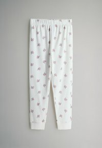 Biele pyžamové nohavice s kvetinovým vzorom a ružovými kvetmi. Mäkká tkanina, elastický pás a priliehavé manžety na členkoch.