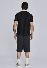 SIKSILK Polo majica - black
