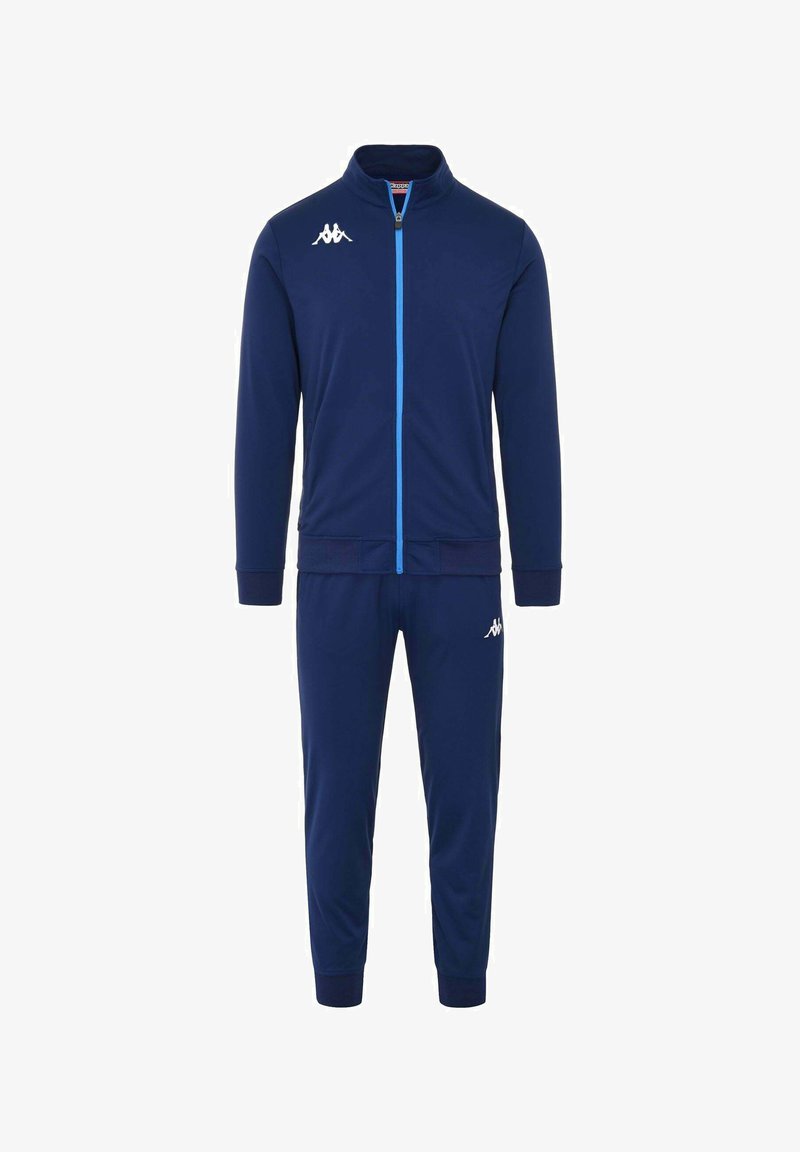 Tuta sportivo blu navy realizzata in tessuto liscio, con giacca zip-up con dettagli blu e pantaloni affusolati abbinati. Logo Kappa su entrambi i capi.