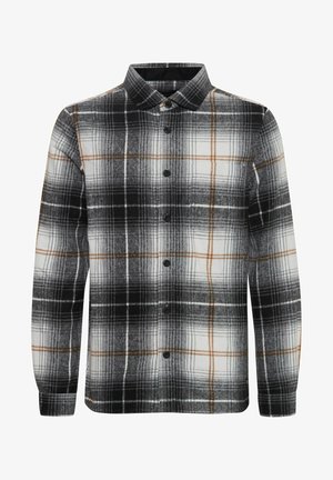 Fekete-fehér kockás ing barna részletekkel, gombos gallérral és hosszú ujjakkal, puha anyagból készült, laza szabással.