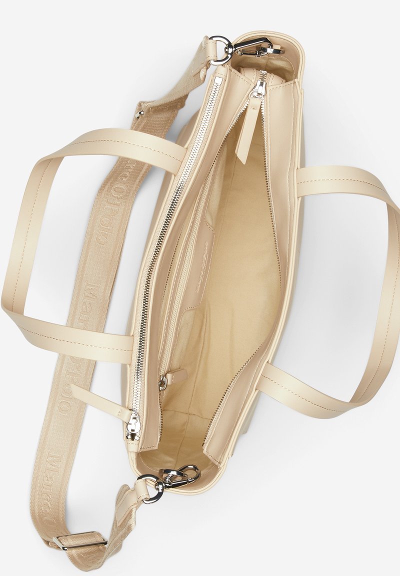 Beige Handtasche aus glattem Leder, mit einem geräumigen Innenraum, doppelt verzinkten Reißverschlüssen und kurzen sowie langen Trägern für vielseitigen Tragekomfort.