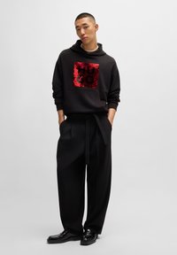 HUGO DESEQINO - Jersey con capucha - black