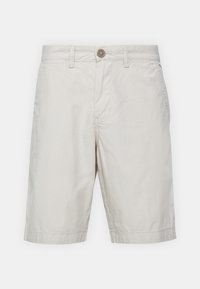 Pantaloni corti di cotone color beige chiaro con chiusura a bottone, due tasche laterali e una linea dritta, caratterizzati da una texture liscia e senza motivi.