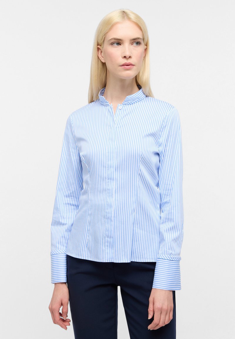 Blue and white striped button-up shirt with long sleeves and a mandarin collar; smooth fabric and straight cut with cuffed sleeves.