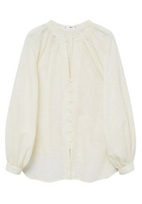 Helle Cremebluse aus weichem Stoff, mit Rundhalsausschnitt, durchgehender Knopfleiste, langen Puffärmeln und einem strukturierten Punktmuster über die gesamte Oberfläche.