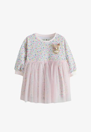 Pikad varrukadega beebide kleit pastelse lillemustriga, roosa tuutu seelikuosaga ja väikese koomiksikujundiga plaastriga rinnal.