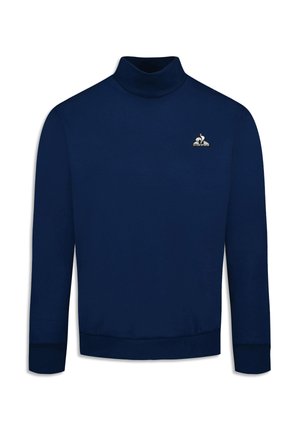 Chemise col roulé à manches longues bleu marine en tissu doux, avec un petit logo brodé sur la poitrine et des poignets et un ourlet côtelés.