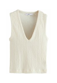Cream-colored sleeveless top with a deep V-neck. Textured fabric with a ribbed pattern. Label reads "NEXT."