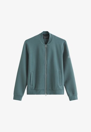 Tealgrüne Bomberjacke mit Reißverschluss, geripptem Kragen, Bündchen, Saum und zwei vorderen Leistentaschen.