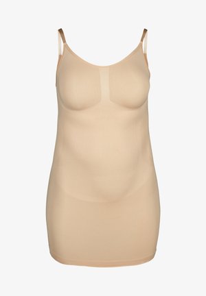 Beige naadloze hemd met verstelbare bandjes, aansluitende pasvorm, geribbeld textuur en een gladde afwerking, ontworpen om onder kleding te dragen.