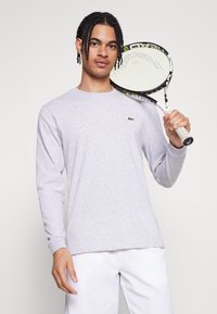 Lacoste Sport LONG SLEEVES SPORTS T-SHIRT COTTON - Ilgarankovis viršutinės dalies drabužis - silver chine