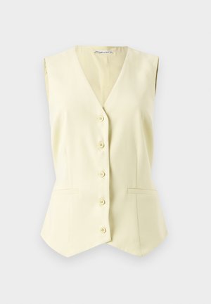 Ujjatlan, világos sárga mellény V nyakkal, hat középső gombbal és két elülső zsebbel. Sima anyag, testre szabott fazon.