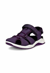 Violet urheilusandaalit, joissa on kevytrakenteinen muotoilu, säädettävät hihnat, avonaiset varpaat ja valkoinen pohja, joka tarjoaa pitoa ja mukavuutta.