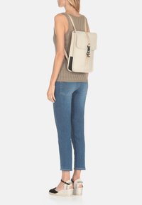 Rains MICRO W3 - Sac à dos - dune