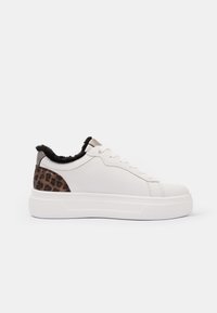 White sneakers with a textured upper, featuring a leopard print accent on the heel and soft black detailing around the collar.