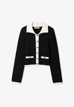 Schwarze, verkürzte Strickjacke mit strukturiertem Strick, ausgestattet mit einem weißen Rippenkragen, fünf Knöpfen und zwei Vorderaschen mit weißen Akzenten.