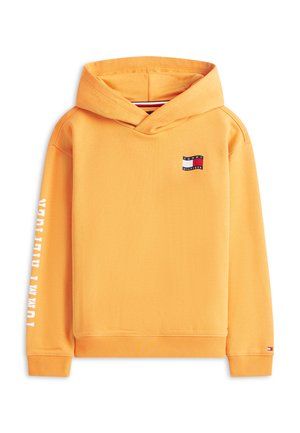 Žlutá mikina s kapucí s malým logem Tommy Hilfiger na hrudi, bílým nápisem "TOMMY HILFIGER" na levém rukávu a žebrovanými manžetami a lemem.