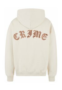 Cremefarbener Hoodie mit Kordelzugkapuze und gerippten Bündchen. Auf der Rückseite prangt in kräftigen braunen Buchstaben das Wort "CRIME". Glatte Textur.