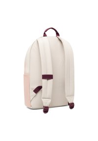 Béžový batoh s ružovou postrannou kapsou, nastavitelnými vínovými popruhmi a hornou rukoväťou. Hladká textura s minimalistickým dizajnom.