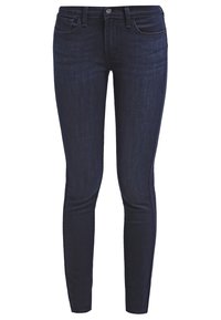 Jeans skinny de algodón en azul oscuro, con un diseño clásico de cinco bolsillos, trabillas para cinturón y cierre de un solo botón.