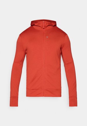 Red zip-up hoodie with a hood, featuring long sleeves and cuffs. Made from textured fabric with a small zippered pocket on the chest.