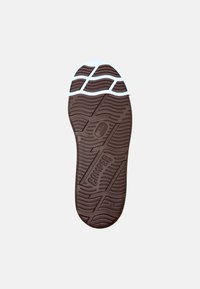 Brown rubber outsole with a textured pattern, featuring wavy lines and a white accent at the toe. Branding included: "CAMPER" and size "42."