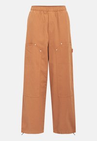 Cargo pants in a warm brown color, featuring an elastic waistband, two large front pockets, and zippered cuffs for adjustable fit.