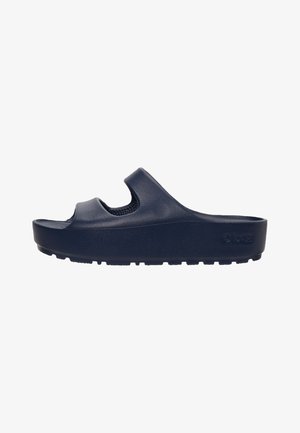 Navy blue slide sandal made of lightweight material, featuring a textured upper with two cut-out openings for breathability and grip sole.