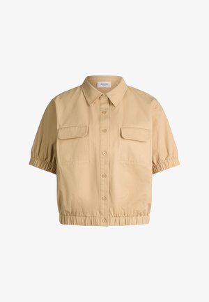 Beżowa krótka koszula z krótkim rękawem, krótkim krojem, zapinana z przodu na guziki, z dwoma klapkowymi kieszeniami na piersi, elastycznym dołem i elastycznymi mankietami na rękawach.