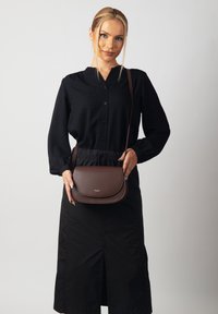 Carlheim JOLIE - Cross body bag - brown